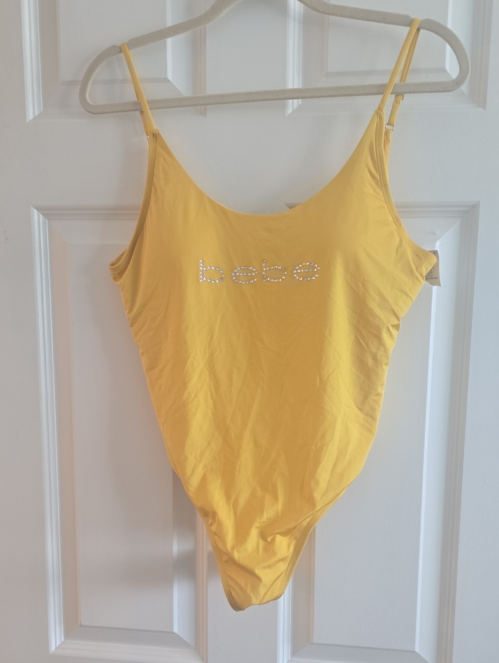 bebe Yellow One-Piece Bodysuit with Rhinestone Logo